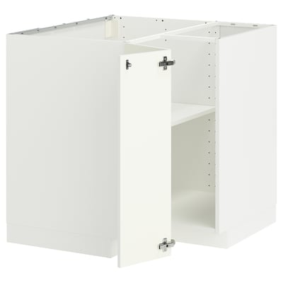 A white METOD kitchen corner base cabinet set. It a sturdy frame with adjustable shelves and reversible doors.