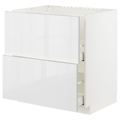 White METOD kitchen cabinet with high gloss drawer and smooth, sleek design.