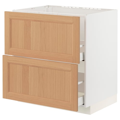 Modern white kitchen cabinet with oak drawers and door.