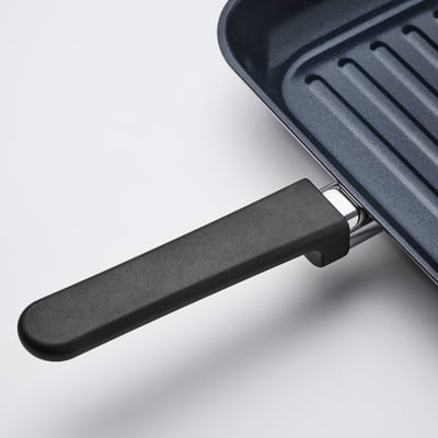 Midagsmat square grill pan, black with silver handle, stainless steel base, ribbed non-stick surface.