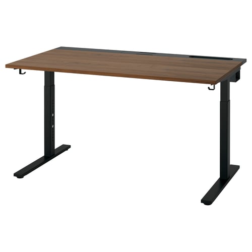 MITTZON adjustable desk in walnut and black. Rectangular top with black metal legs. Height-adjustable, suitable for standing/sitting.