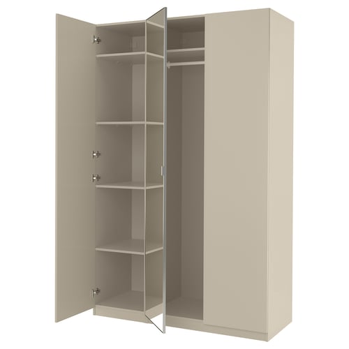 An open beige PAX wardrobe with multiple shelves and hanging space.
