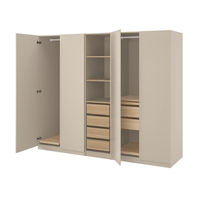 An open beige PAX wardrobe with shelves and drawers.