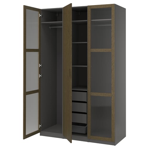 An open PAX wardrobe in dark grey with wooden accents. It shelves, drawers, and hanging space.