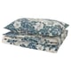 Folded floral bedding set, blue-white, organic patterns, rectangle.