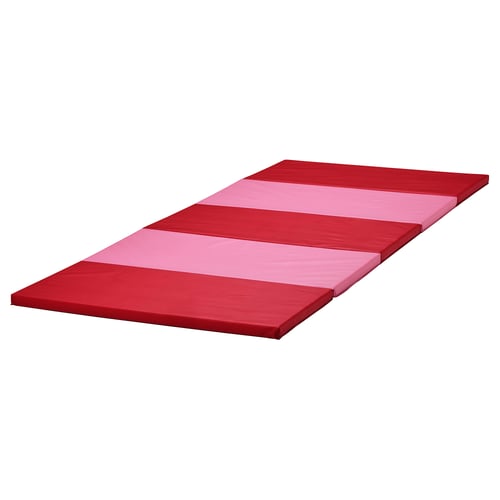 A red and pink foldable gym mat for children. Its soft, made of recycled polyester and polyethylene foam, and designed for safety and fun.