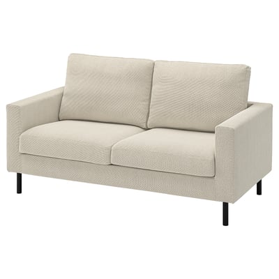 Modern beige sofa with clean lines, soft cushions, and black legs. Ideal for cosy seating.