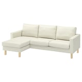 Light beige fabric sectional couch with wooden legs. Modern, clean-lined design.