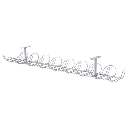 A SIGNUM cable management trunk. Its silver, made of steel, and designed to organise cables under a table.