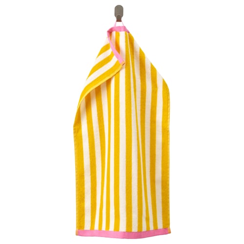 A hanging yellow and white striped towel with pink trim, made of cotton.