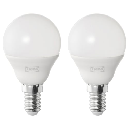 Two white spherical led bulbs with silver bases by IKEA, positioned side by side, featuring a smooth design and cool-white lighting.