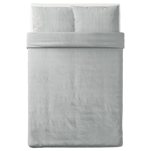 A neatly made bed with SPJUTVIAL grey duvet cover and pillows, featuring soft jersey knit, zip closure, and made from 100% cotton.