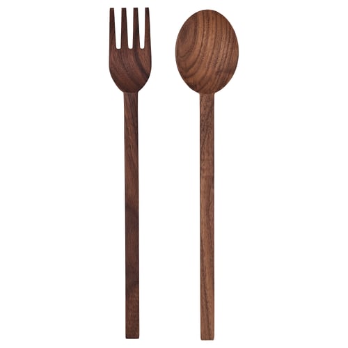 Two walnut salad servers, one spoon and one fork, in a sleek, minimalist design.