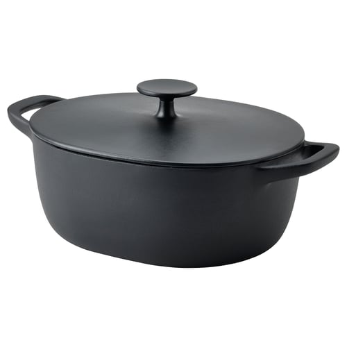 Black cast iron cookware with lid and handles, designed for even heat distribution and oven-safe use.