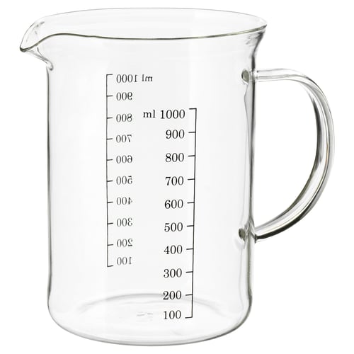Clear glass measuring jug with handle and markings for measuring liquids.