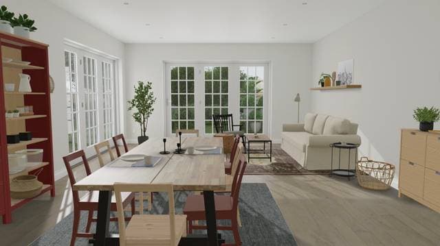 open dining room and living room idea with red and light wood chairs and cabinets with farmhouse dining table