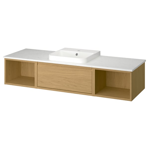 Modern floating bathroom vanity in oak, white marble top, single basin, open shelves.