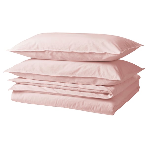 A stack of pink ÄNGSLILJA cotton bedding set, including a duvet cover and pillowcases, neatly folded.