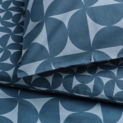 Close-up of blue patterned duvet set. Elaine texture, crisp & soft.