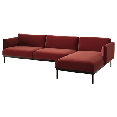 Modern red l-shaped section sofa, sleek metal legs, cosy cushions.