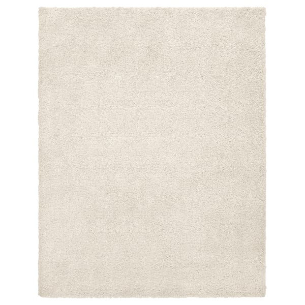 Cream square rug, durable & stain-resistant, ideal for bedrooms/living rooms with plush, sound-absorbing pile.
