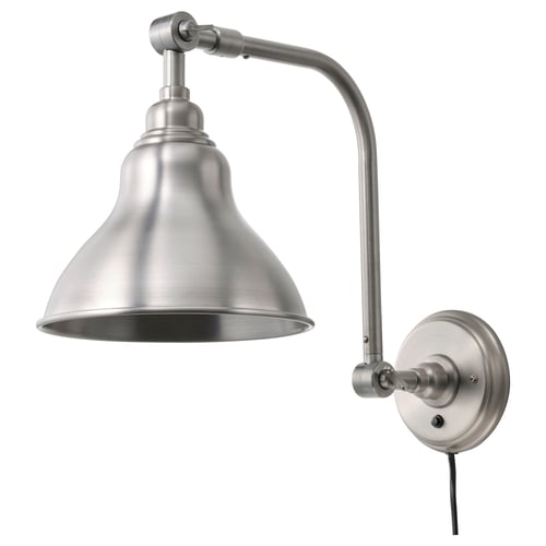 A brushed steel wall lamp, ANKARSPEL, with an adjustable arm and bell-shaped shade.