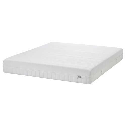 White ÅNNELAND hybrid mattress, rectangular, quilted surface, firm and supportive.