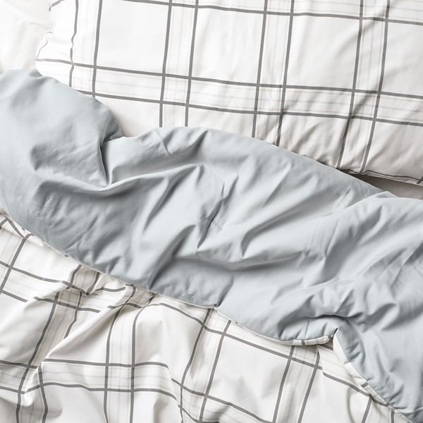 Smooth, chequered comforter with silky, soft embrace feel.