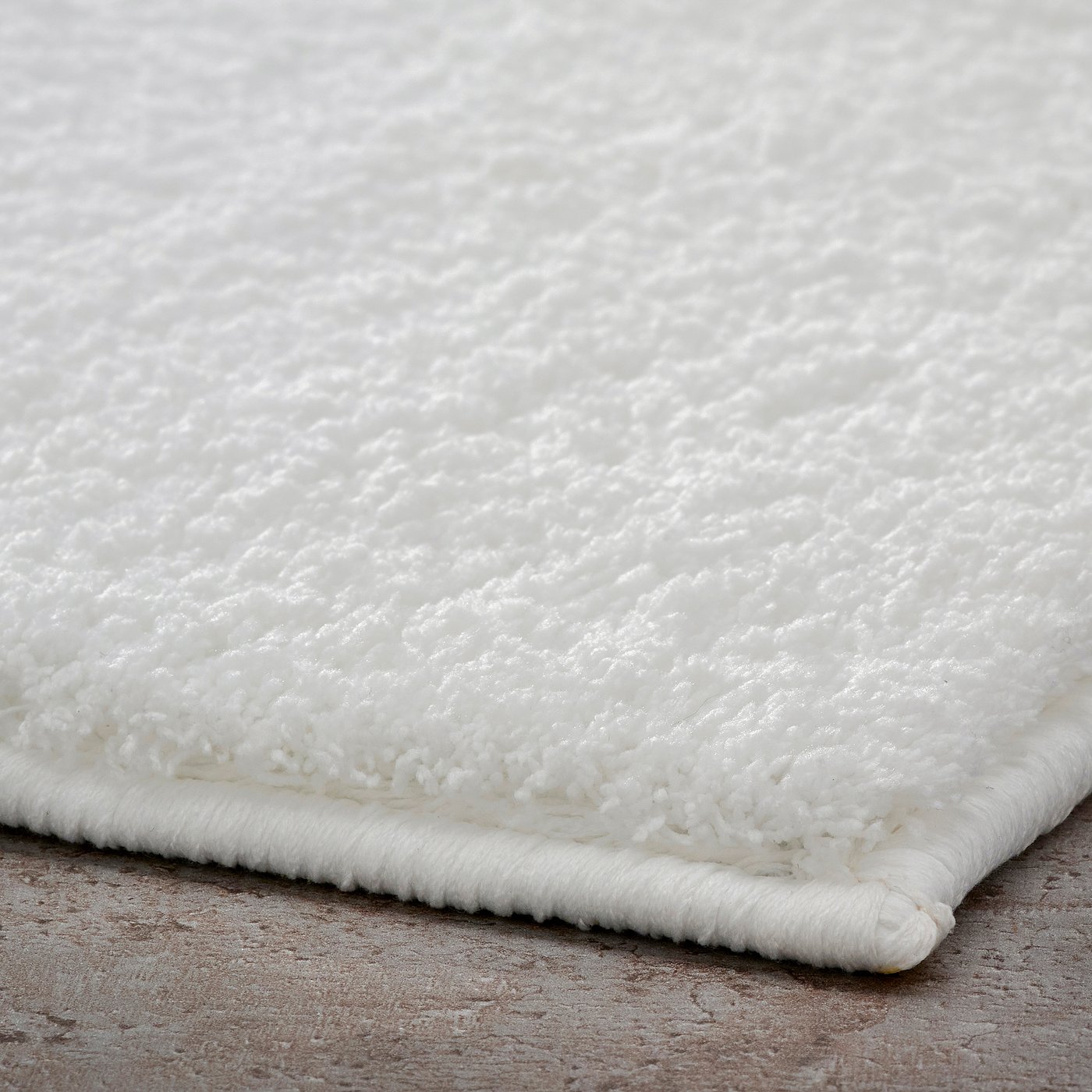 BACKMÅRA bath mat, white, 20x31