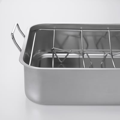 Stainless-steel roasting tin with rack. Sturdy handles, ideal for oven or grill.