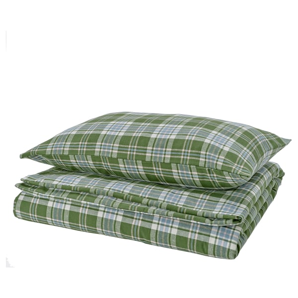 Folded green plaid pillow and blanket set with white squares, made of 100% cotton.