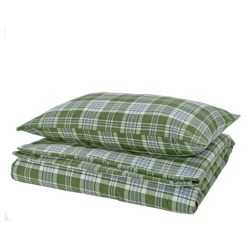Folded green plaid pillow and blanket set with white squares, made of 100% cotton.