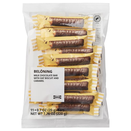 Clear bag with stacked BELÖNING milk chocolate bars.