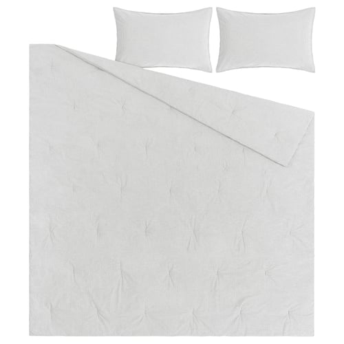 The BERGPALM bedding set includes a white, striped comforter and two matching pillow shams, made from soft 100% cotton with a vintage stripe design.