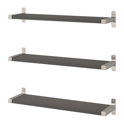 Three sleek BERGSHULT black wall shelves with nickel brackets.