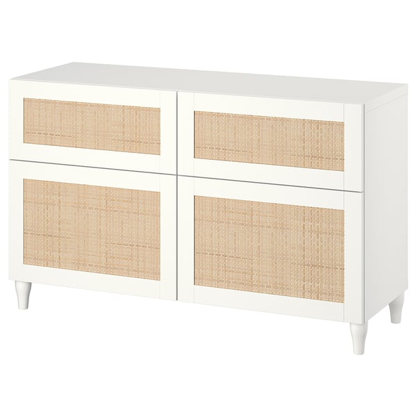 A white BESTÅ sideboard with four doors featuring woven panels. It has adjustable shelves and drawers.