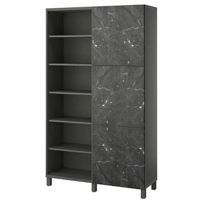 Modern black BESTÅ bookshelf marble-pattern doors, open shelves, and metal legs.