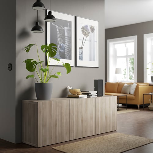 BESTÅ storage combination with doors, walnut effect light gray