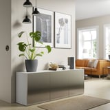 BESTÅ Storage combination with doors, white/Riksviken light bronze effect, 70 7/8x16 1/2x25 5/8 "