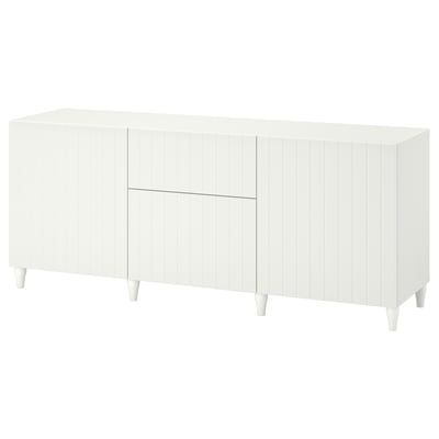 A white BESTÅ sideboard with square legs and adjustable shelves for versatile storage.