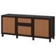 Black BESTÅ sideboard with woven doors, modern design.