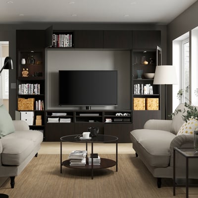 Modern living room with BESTÅ tv storage unit, adjustable shelves, cable management, and soft-closing drawers.