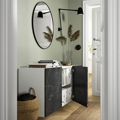 Modern entryway with BESTÅ storage. Open shelves, drawers, mirror, & wall lamps.