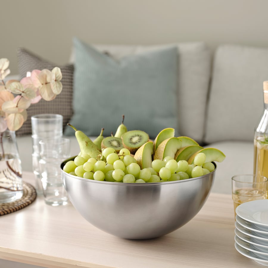 Stainless steel fruit bowl BLANDA BLANK with glasses and plates.
