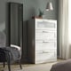 White BRIMNES dresser with frosted glass top drawer, mirror, and curtains. Modern, minimalist style with ample storage.