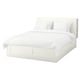 BRIMNES bed, white, wood, rectangular, minimalist design, with storage drawers and headboard.
