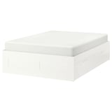 The BRIMNES white platform bed with 4 drawers, featuring clean lines and space-saving design.