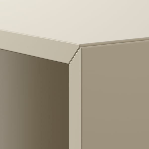 Clean corner join of modern storage unit, beige with smooth edges.