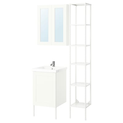 Image shows a white bathroom setup with vanity, shelves, and mirror.
