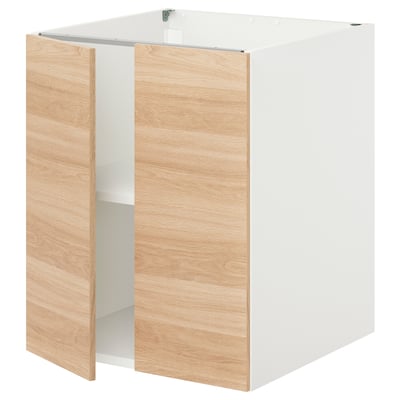 An ikea ENHET base cabinet in white with a light oak door, standing upright with one door open.